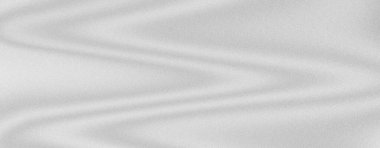 Kabarık bir dokusu ve pürüzsüz dalgalı çizgileri olan soyut beyaz arkaplan zarafet ve hareket hissi yaratıyor.