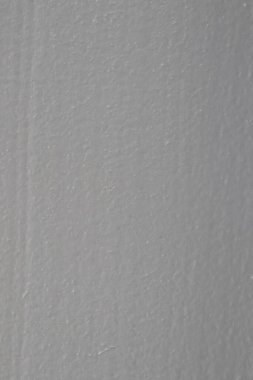Çeşitli yaratıcı projeler için uygun bir arkaplan olarak gri dokulu yüzey görünümünü kapat