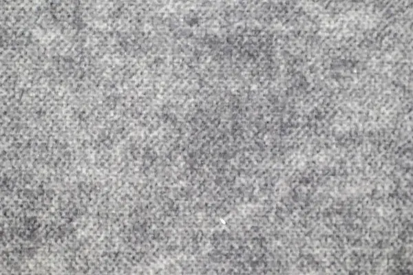 Gri halı dokusu nötr ve çok yönlü bir arkaplan sağlar, iç tasarım veya ev dekorasyonu için mükemmeldir