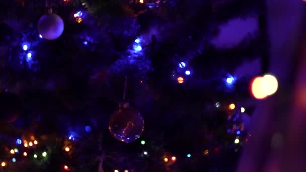 Shiny Christmas Toys New Year Flashing Garland Dark Room Blurry — Stock Video