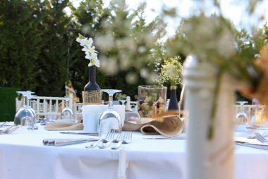 Dining table prepared for wedding dinner