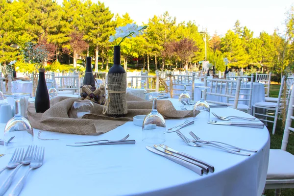 Outdoor Wedding Reception with Elegant Table Decorations