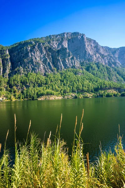 stock image Beautiful lake with amazing view among mountains and greenery
