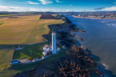 Lighthouse on the coast of the North Sea in Scotland, view from above