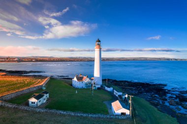 Lighthouse on the coast of the North Sea in Scotland, view from above
