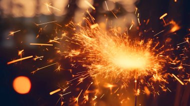 Uçan kıvılcımlarla parlak bulanık renklerde güzel arkaplan resmi.