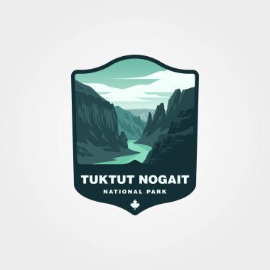 Tuktut Nogait National Park showcases a stunning river canyon landscape. Perfect for travel brochures, environmental education materials. clipart