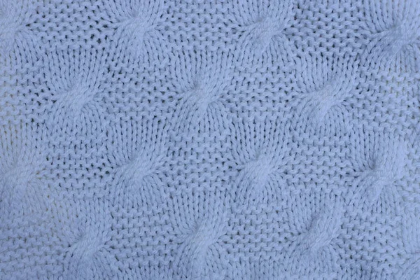 ニットパターンのウール生地で作られた生地の白い質感 — ストック写真