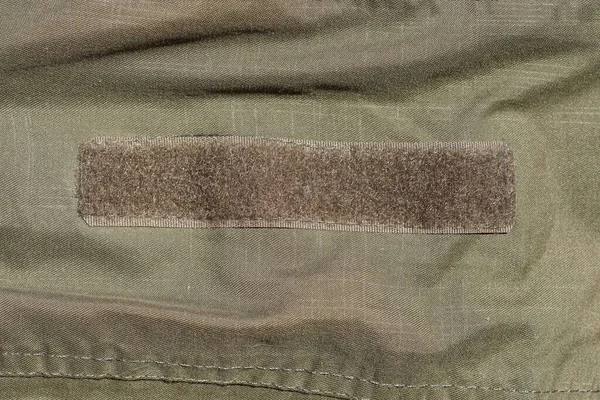 Velcro Plastique Marron Sur Tissu Vert Sur Des Vêtements — Photo