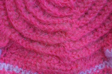 Kumaşın içine yün örülmüş bir kumaşın kırmızı dokusu.