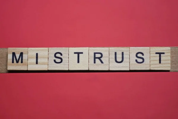 Text Word Mistrust Gray Wooden Small Letters Black Font Red — Stock Photo, Image