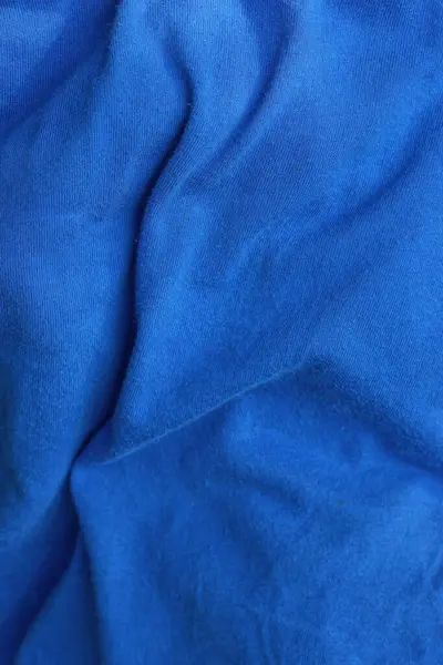 用一块皱巴巴的蓝布织成的织物的结构 — 图库照片