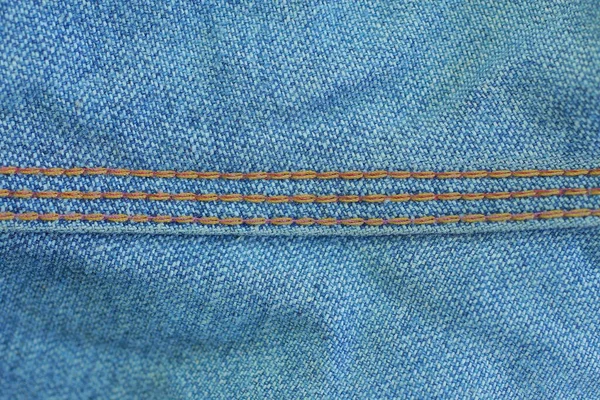 Textura Tela Azul Mezclilla Triturada Desgastada Pantalones Con Una Costura —  Fotos de Stock