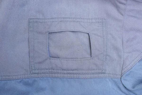 Textura Tecido Cinza Uniforme Com Bolso Emblema — Fotografia de Stock