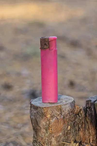 One Old Plastic Pink Lighter Stands Gray Wooden Stump Street — Stock Photo, Image