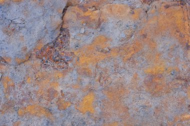 Paslı eski püskü demir duvarın gri kahverengi metal dokusu.