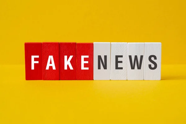 stock image Fake news - word concept on building blocks, text, letters