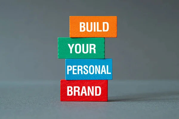 Build your personal brand - word concept on building blocks, text, letters