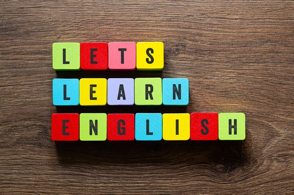 Lets learn english - word concept on building blocks, text, letters