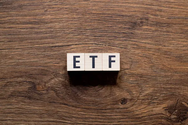 ETF - Exchange-traded fund , word concept on building blocks, text, letters
