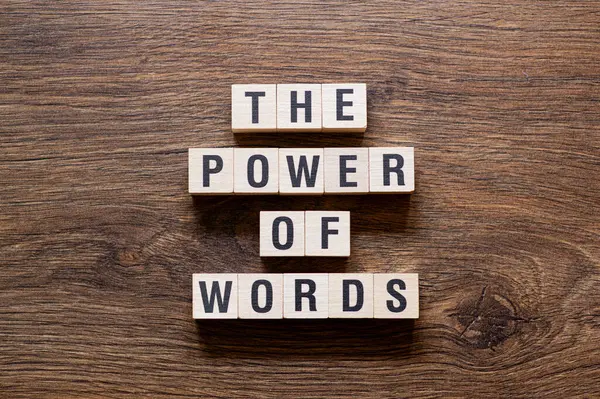 The power of words - word concept on building blocks, text, letters