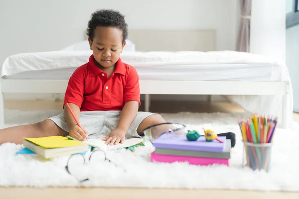Little Boy Draws Picture Crayons Notebook Home Floor His Room — Stock Photo, Image