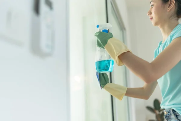 Female Hand Green Gloves Cleaning Door Blue Rag Spray Detergent — Stock Photo, Image