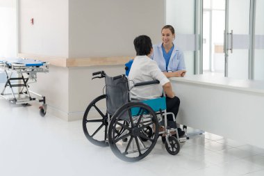 Elderly woman checking blood pressure To check the health of the body by the doctor for advice.
