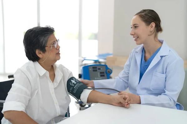 Elderly Woman Checking Blood Pressure Check Health Body Doctor Advice — Fotografia de Stock