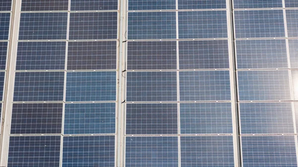 Technology solar cell, Solar cell on the roof of factory industry, Solar panels on factory roof, Top view taken by drone