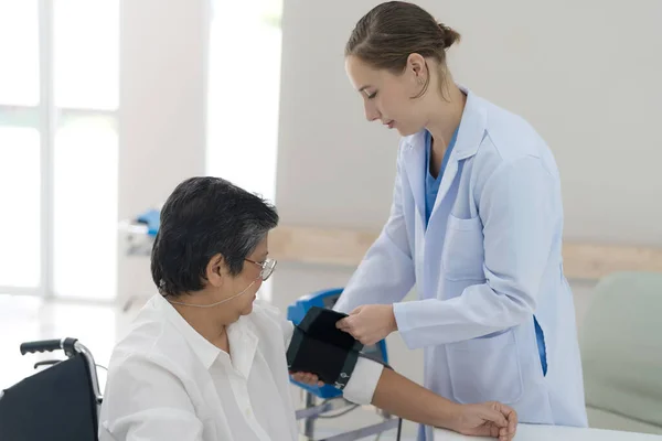 Elderly Woman Checking Blood Pressure Check Health Body Doctor Advice — Fotografia de Stock