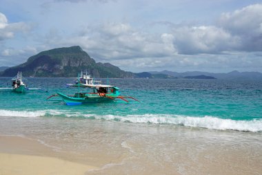 Filipinler 'deki Palawan Adası' nda tahtadan yapılmış tekneler.