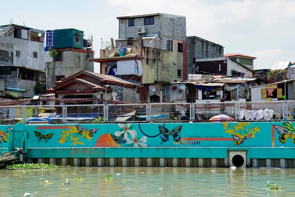 stock image Manila, philippines, circa March 2023 - run down squatter homes at the pasig river