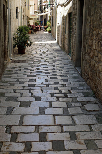 Small narrow alley in the old town of sibenik in croatia