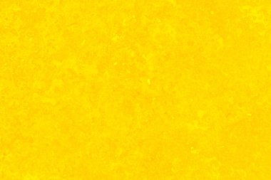 Soyut duvar arkaplan dokusunda sarı beton ya da çimento malzeme.