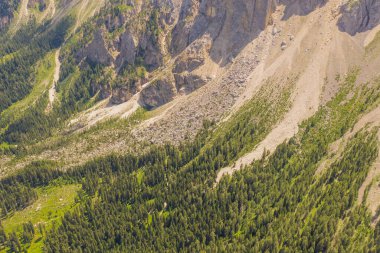 Drone photography of mountain rock slide during summer day
