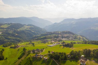 Drone photography of small mountain town during summer day