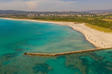 Drone photography of blue seaside and sandy beach during summer day