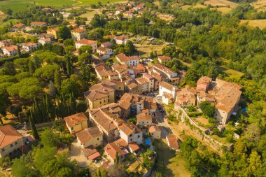 Drone photography of small tuscan rural town during summer day