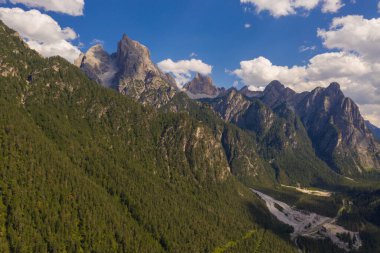 Drone photography of mountain peaks during summer day