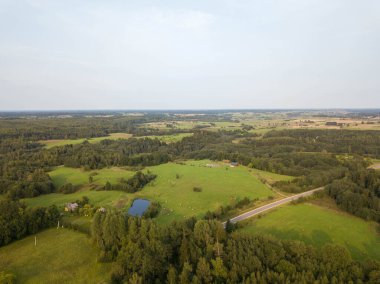 Drone photography of agriculture fields and rural landscape during summer day
