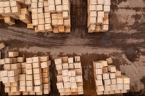 stock image Drone footage piles of lumber in sawmill during summer day. Directly above