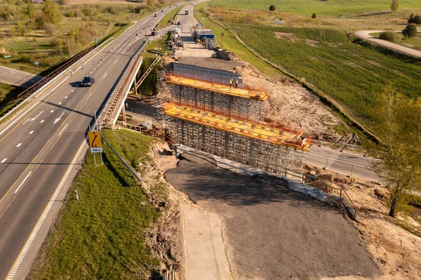 stock image Drone photography of highway bridge being built during summer day. High angle view