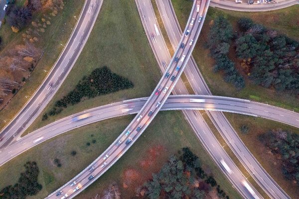 Drone photography of high intensity road traffic in a city during morning autumn morning rush hour
