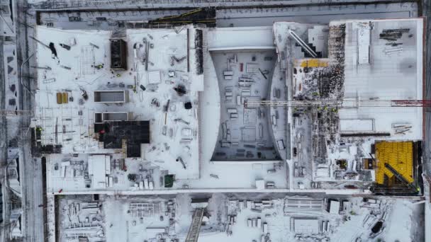 Drone Footage Constructions Site Surrounded Buildings City Covered Snow Cloudy — Stock Video