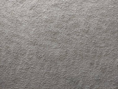 Kahverengi kremalı taş duvar dokusu genellikle evlerin duvarlarına ya da lüks villalara monte edilir.