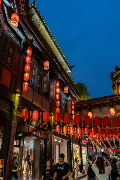 stock image Chengdu, Sichuan, China, 04 June 2023: People on Jinli ancient street, night scene; Jinli Ancient Street is a well-known pedestrian commercial street in Chengdu