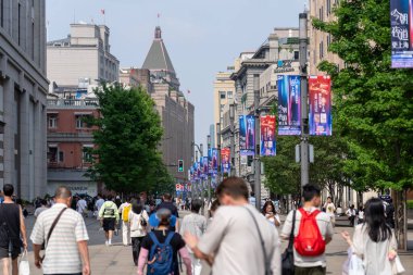 Shanghai, China, June 04, 2024: View from Nanjing shopping street in Shanghai, which is a top attraction near the Bund in Shanghai. clipart