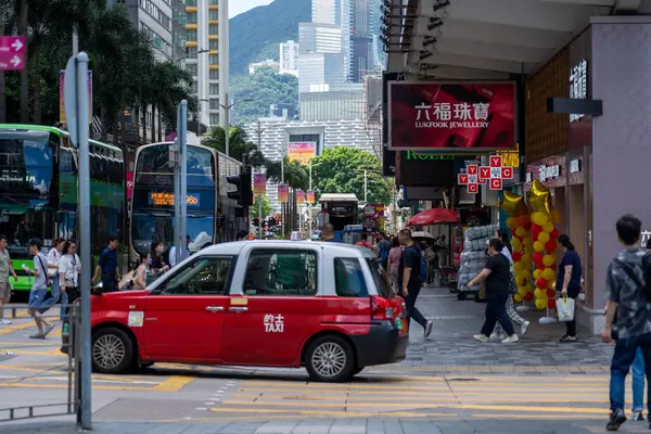 stock image Tsim Sha Tsui, Hong Kong: July 03, 2024:  street view in Tsim Sha Tsui, this is a very popular shopping place in Hong Kong.