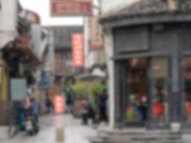 Çin 'in Hangzhou kentindeki bir sokak sahnesinin bulanık ve bulanık bir fotoğrafı..